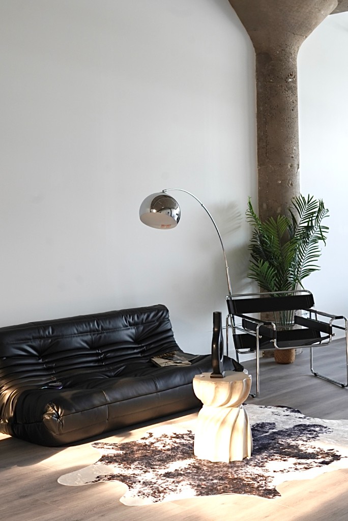 Soul Studio — leather sofa and arc lamp